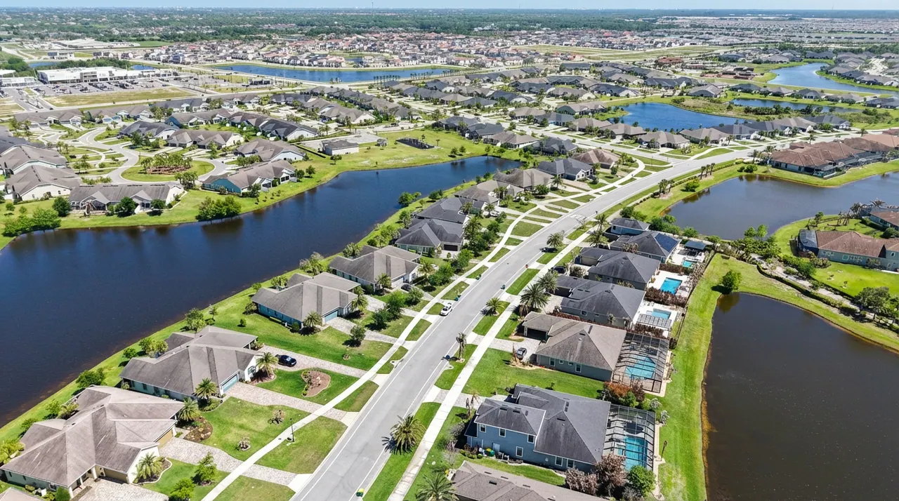 Brevard County waterfront with palm trees and tropical landscaping